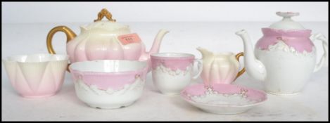 An early Foley ( Pre Shelley ) two tone blush teapot, creamer and sugar bowl together with another 3