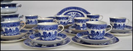 A good collection of 19th century blue and white ceramics from trio's to tureens, willow pattern
