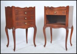 A near pair of mid century French cherrywood bedside cabinets. Each raised on sabre legs with shaped