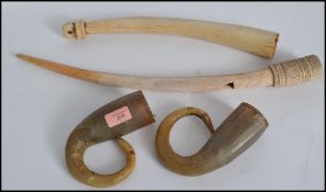 A pair of non matching 19th century worked Ivory tusks together with a pair of late 19th / early