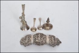 An unusual continental silver 800 stamped three part belt buckle depicting deities on a rococo