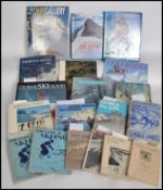 A collection of skiing related books mainly first editions to include; The Story of Skiing (