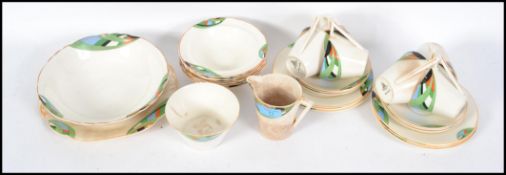 A vintage 1930s art deco Wedgwood hand painted and transfer printed 6 person tea service and dessert