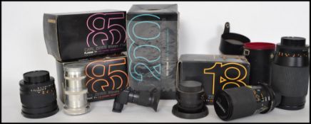 A collection of vintage / retro 20th century camera lenses predominately Carl Zeiss Contax  to