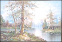 A oil on canvas painting of a riverside forest sunset scene signed to lower corner Browning set in a