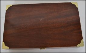 A mahogany cased Cigar Humidor box with sectional appointed interior. The inside lid being marked