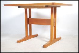 A 1970's retro Danish teak and tile top dining tab