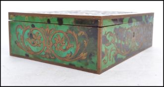 A 19th century Boulle work and green faux tortoise shell cigarette box having a hinged lid opening