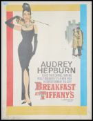 A colourful stretched canvas print of the film Poster ' Breakfast At Tiffany's ' starring Audrey