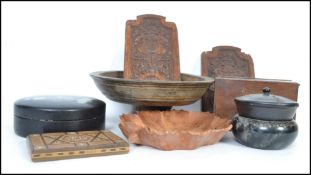 A good collection of vintage wooden and treen wares to include a turned wood bowl on tapering