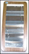 A retro frameless 1970's wall mirror of lozenge form being acid etch decorated to the corners.