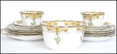 A stunning 19th century Art Nouveau bone China part tea service having hand painted finish over