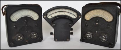 A pair of early 20th century vintage woodworking desks - school desk. Each with hinged tops raised