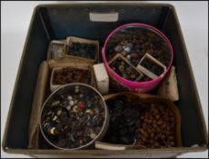A large collection of vintage buttons and beads etc to include wooden, plastic, large small, various