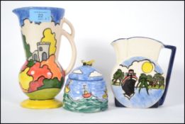 A group of Vicary Ware ceramics to include a Jug in the Ulverscroft pattern a honey pot in the St