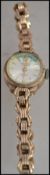 A vintage 20th century ladies hallmarked Majex 9ct gold cocktail watch with a hallmarked 9ct gold