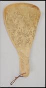 An early 20th century South East Asian finely carved and pierced  home hand fan depicting Deities