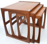 A G-Plan retro teak wood 1970's graduating nest of tables in the Quadrille pattern. The tables