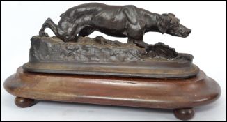 After Pierre Jules Mene (Fr.1810-1879) - A good Gun dog, patinated bronze study being raised on