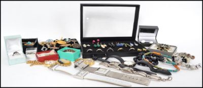 A good collection of vintage costume jewellery to include bracelets, bangles, necklaces, watches,