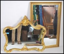 Contemporary gilt framed wall mirrors to include a bevelled edge mirror of rectangular form together