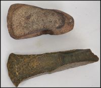 2 believed neolithic bronze axe heads, each of dif