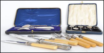 A collection of silver and silver plated items to include a cased silver hallmarked Christening set,