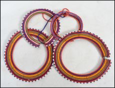 A group of four vintage African Tribal Maasai bead work wedding necklaces having varying strands