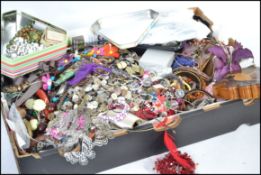 A large collection of various costume jewellery to include bracelets, bangles, beads, necklaces