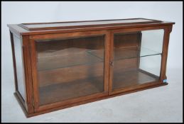 A good Victorian mahogany shop display - haberdashery cabinet of long form with twin doors and