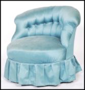 A Victorian 19th century mahogany boudoir swivel chair / armchair of swivel action and tub form.