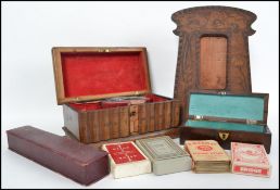 A collection of items to include an early 20th century Sorrento souvenir puzzle box together with