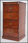 A Victorian solid mahogany campaign upright pedestal chest of drawers being raised on a plinth