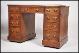 A 19th century Victorian mahogany twin pedestal desk having plinth bases with a series of drawers