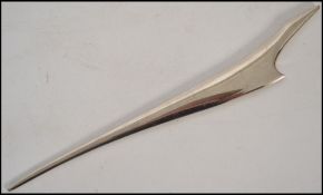 A silver-white metal Concorde Air France paper knife/letter opener in the form of a stylistic