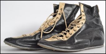 A vintage  20th century pair of leather upholstered two tone blue  and white boxing boots complete