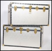 A good pair of 20th century aluminium steamer trunk chests, each with gilt metal clasps and hinges