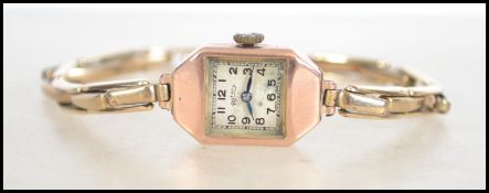 A 9ct gold 375 ladies Rotary cocktail / dress watch having 9ct gold on metal Premet expanding