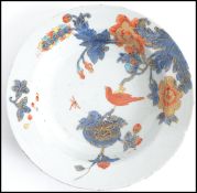 A believed 18th century Oriental blue and white ceramic bowl, with red and gilt detailing