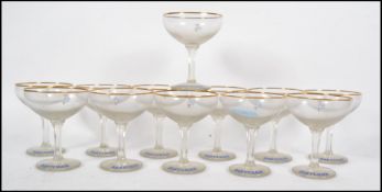 A set of 12 vintage 1950s hexagonal stem Babycham glasses with white fawns. Measures 11cms high.