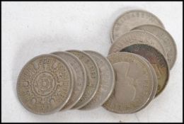 A collection of vintage coins to include British and coins from around the world, dating from the