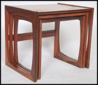 A G-Plan retro teak wood 1970's graduating nest of tables in the Quadrille pattern. The tables