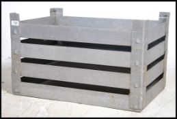 A set of four vintage industrial aluminium stackin