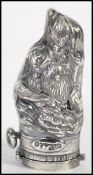 An unusual silver plated vesta case in the form of a hunting dog / dogs head with hinged cap end