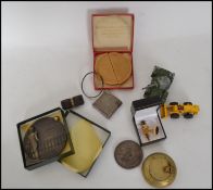 A  vintage trench barrel lighter together with a silver plated Maruman Halley lighter, brass