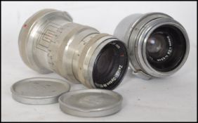 A vintage Zeiss-Opton Biogon T f/2.8 35mm Lens, chrome, serial no. 2203286 together with a Carl