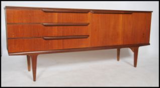 A 1970's retro Danish influence sideboard raised o