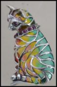 A ladies contemporary Art Nouveau silver and plique a jour brooch in the form of a cat having pin to