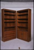 A large pair of antique style 20th century oak veneer bookcases in the Jacobean style having