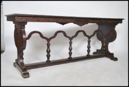 An early 20th century American Federal revival large mahogany refectory dining table marked to the